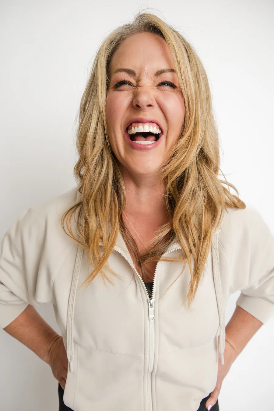 Kate Thomas, laughing, in a photograph
